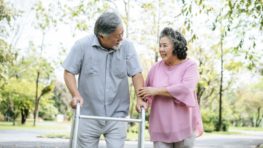 Blog Covers – 2025-03-17T080656.009 Wife helping husband walk outside with a walker