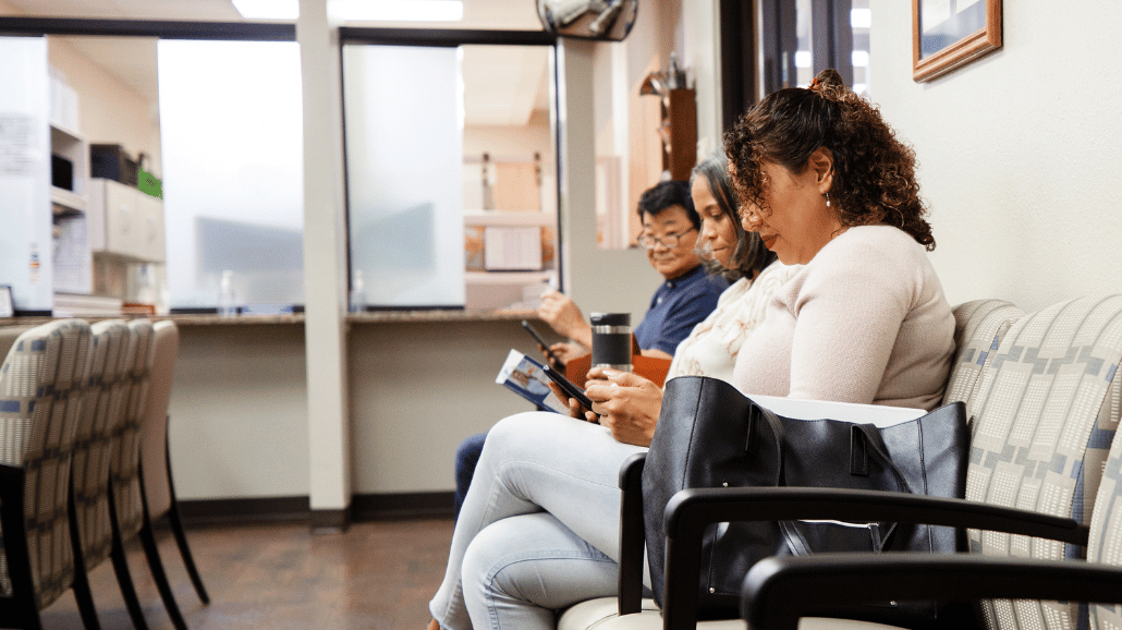 Seniors waiting in a doctor's office lobby