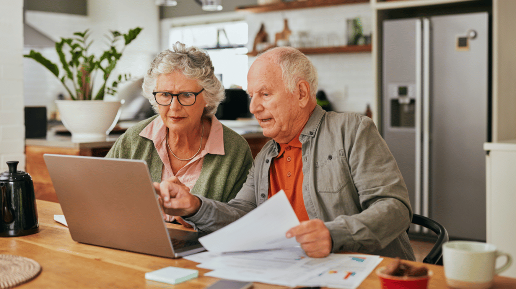 Blog Covers – 2025-07-18T142849.467 Senior couple reviewing finances on a laptop