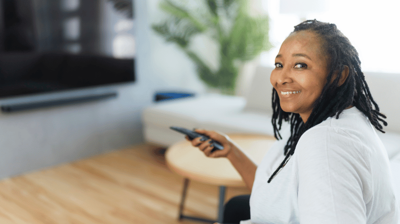 Blog20Covers20-202024-03-27T092948.418 African American woman changing the channels on the TV