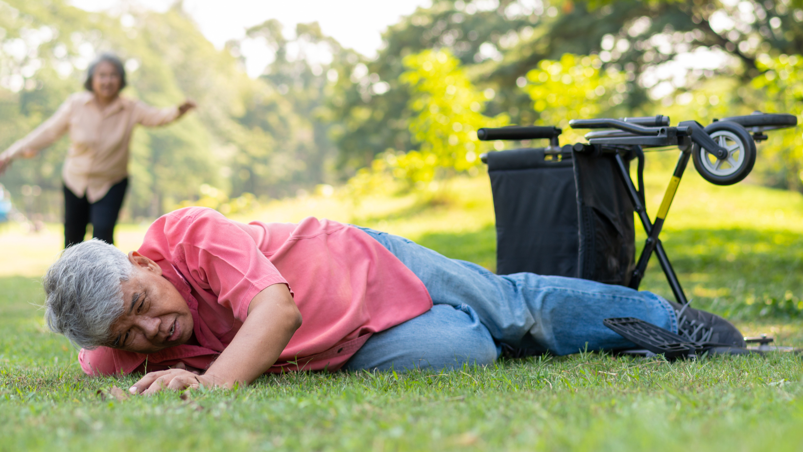 Blog20Covers20284329 Senior an fallen out of a wheelchair on the ground outside with his wife running behind him