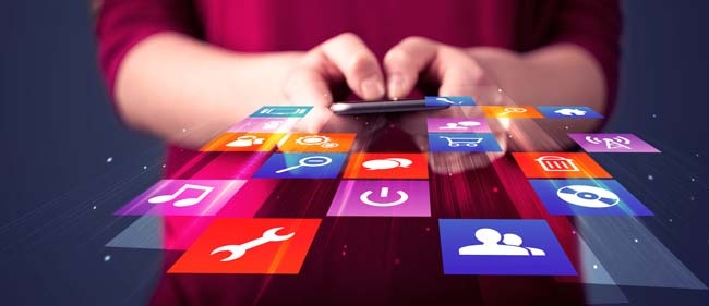Woman typing on a smartphone with icons coming out
