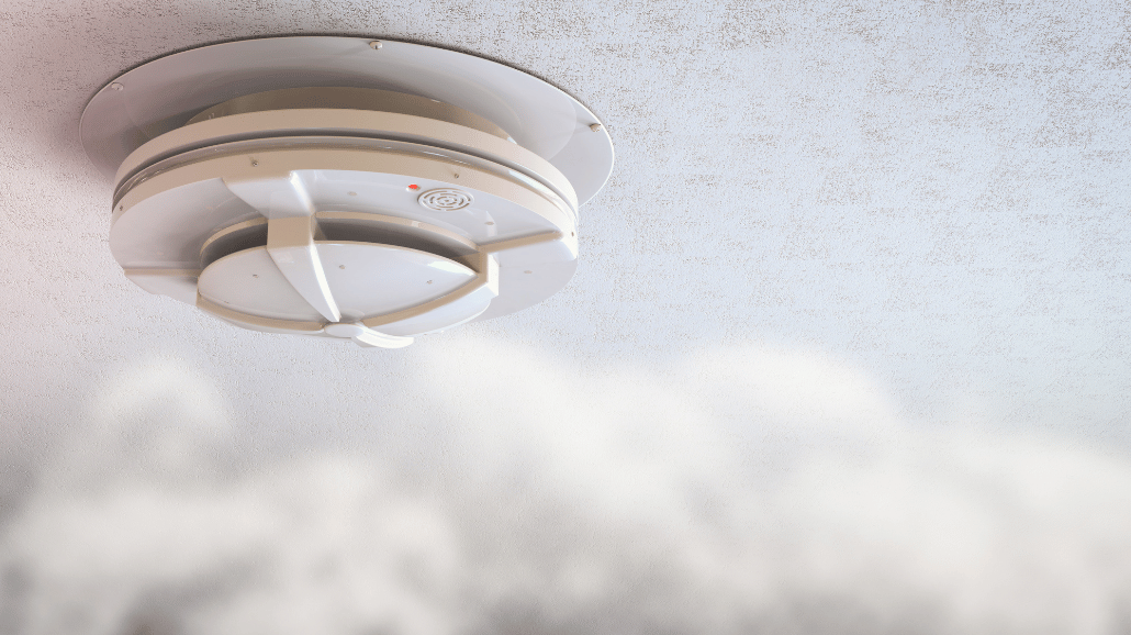Blog Covers – 2025-06-17T140026.720 Smoke detector with smoke near it
