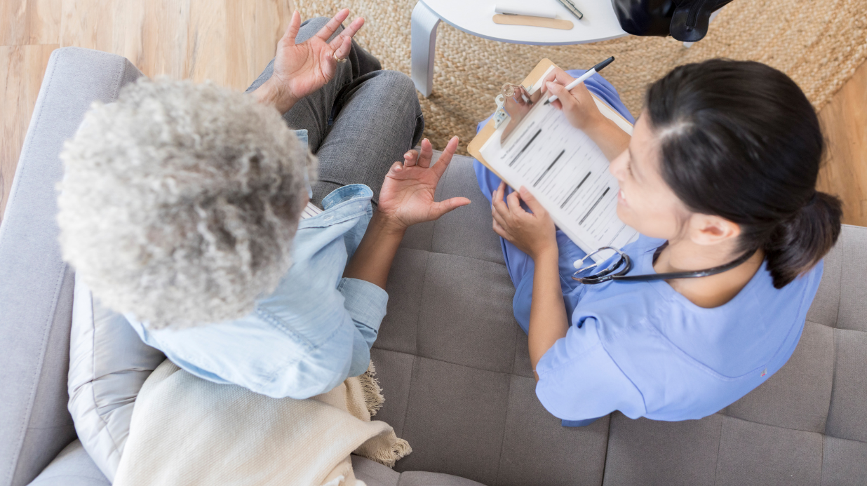 Blog Covers – 2025-08-29T111844.768 Overhead view of senior woman talking to a doctor