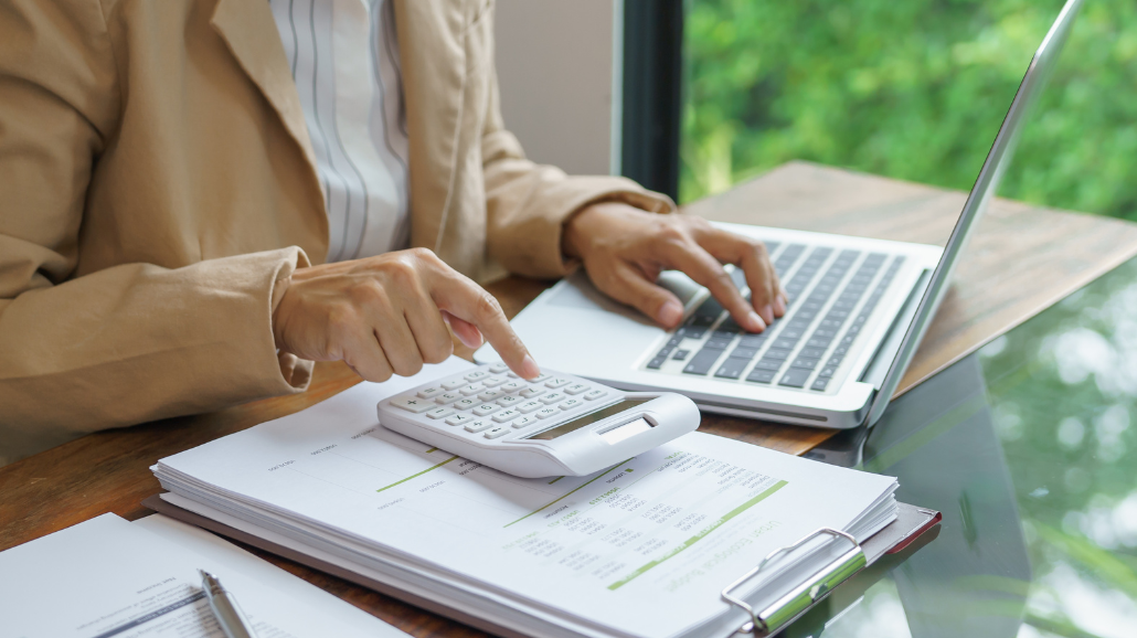 Calculating costs with a spreadsheet and a calculator