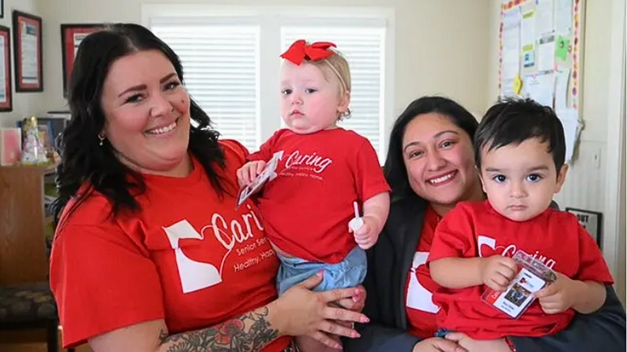 Staff of Caring Senior Service Victoria with their young kids